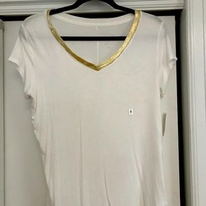 White and gold tshirt